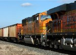 BNSF 9874 trails on 687